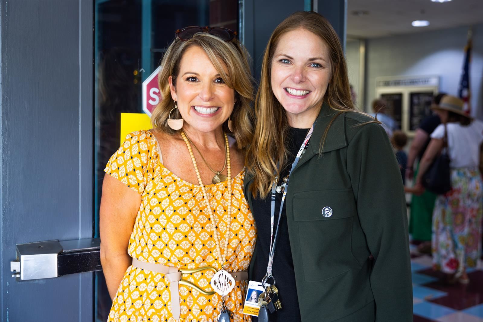 Principal and Assistant Principal Greeting Students